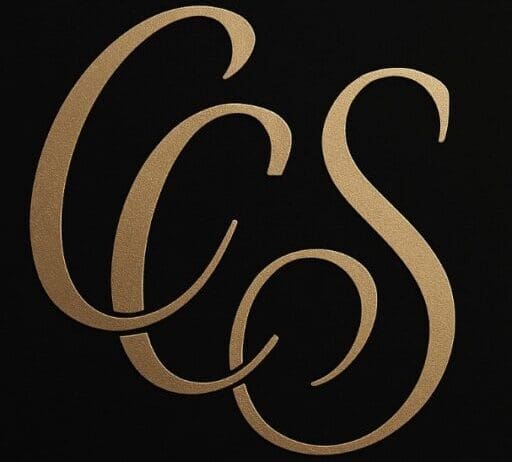 CCS logo with connected gold calligraphy letters on black background